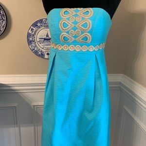 Lilly Pulitzer dress size 2 aqua with gold details. Strapless summer dress.